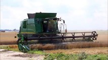 John Deere combine harvesting wheat.2015