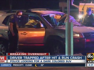 Driver trapped after hit and run crash in Glendale.