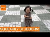 Stubborn Girl Can't Stop Giggling at Squeaky Shoes