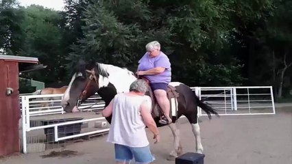 Large Woman Can not Dismount Her Horse