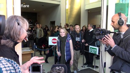 'Heathrow 13' protesters celebrate as they walk free from court