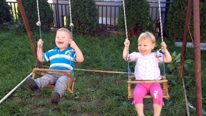 twins baby smiling