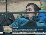 Miles de refugiados permanecen varados entre Macedonia y Grecia