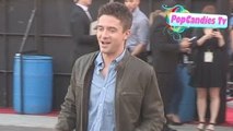Topher Grace takes selfies while greeting fans at American Ultra Premiere in LA