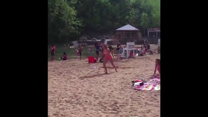 Girl Fails Cartwheel and Face Plants Into Sand
