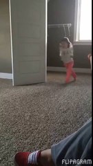 Little girl is doing cartwheel's, then the family pitbull does something adorable