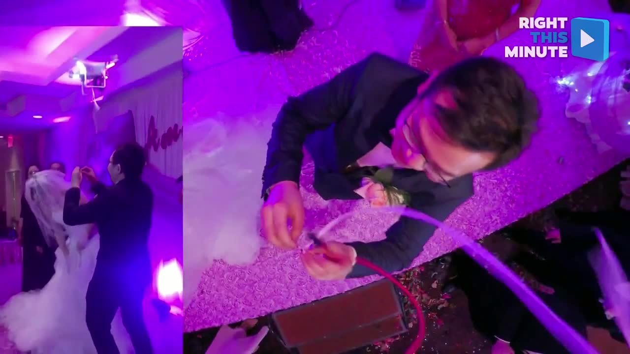 Bride and Groom Receive Wedding Rings From Drone