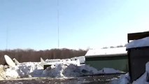 ICE FALLING OFF WJET TV TOWER CAMERA MAN CAPTURES IT WHILE DIVING UNDER COVER