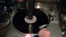 Turning a record player at 1200 RPM using a black and decker corded power drill