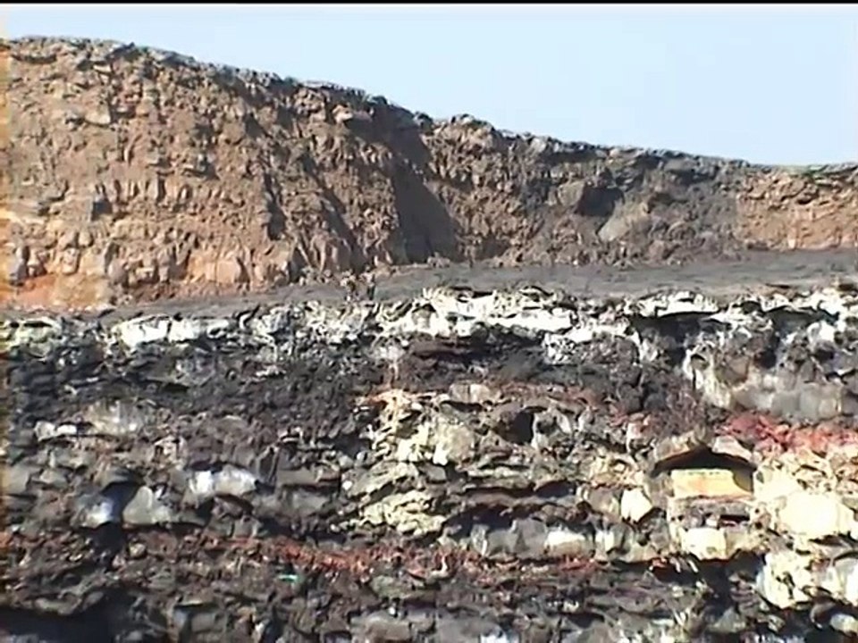 Eruption after person falls in lava lake of volcano (test with organic waste, garbage, trash)
