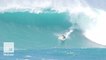 Surfer conquers 60-foot waves to win $75,000