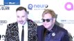 Elton John and David Furnish loved up at Oscar viewing party