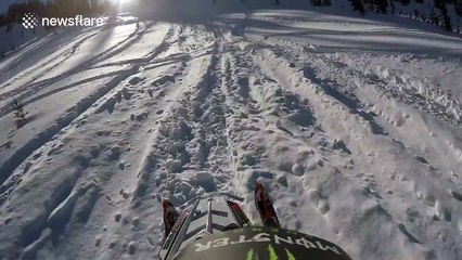 Snowmobile triggers avalanche