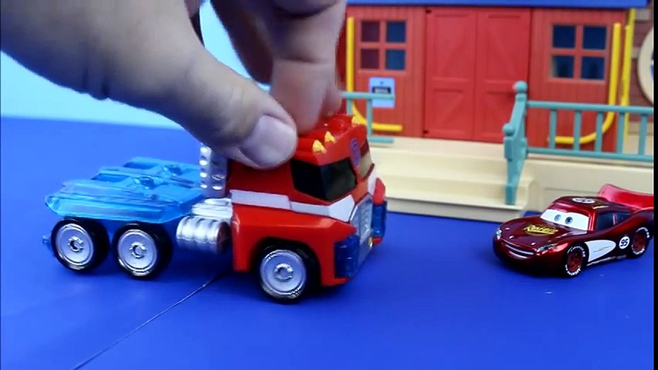 Disney Pixar Cars Lightning McQueen gets saved by Transformers Optimus Prime Bane Joker