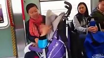Shocking moment train passenger snaps and screams in the face of strangers crying child