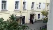 Crazy Guy tries to break a Door with his Head!!