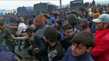 Migrants charge through Macedonia fence on Greek border