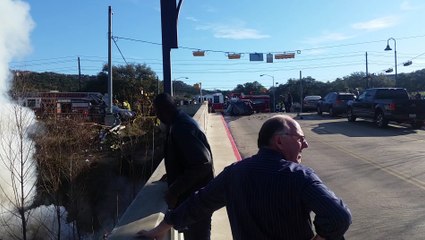 Dump truck flips, catches fire after three-vehicle crash on 2222