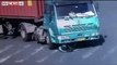 Cyclist Miraculously Escapes Death After Being Run Over By A Large Lorry in China