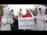 COP21: Envi activists paint Paris red for climate justice