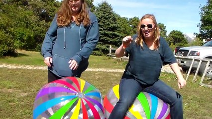 Popping these DAMN beach balls!