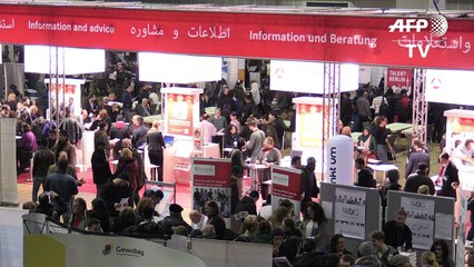 Thousands of refugees attend special job fair in Berlin