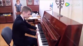 Beautiful footage shows boy playing piano with no hands