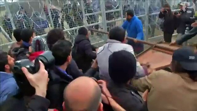 Macedonian police fire teargas at people near border with Greece