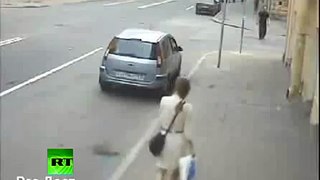 CCTV: Womans narrow escape from car crash chaos