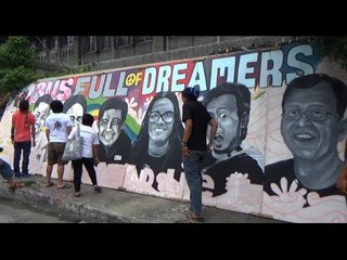 Victims paint protest graffiti in front of GV Florida office