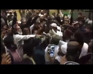 Pervaiz Rasheed hit with shoes at Karachi airport