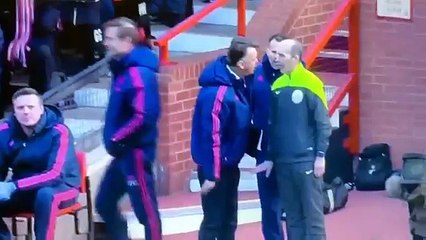 Louis van Gaal falls to the ground in protest at Arsenal's Manchester United victory