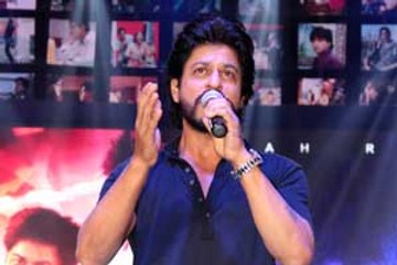 SRK sings and mouths his old dialogues at FAN launch