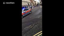 Prison van leaves Old Bailey under escort during gunrunning trial
