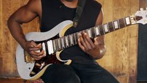 Guitar Lesson: Tosin Abasis hammer-on, downstroke, upstroke technique