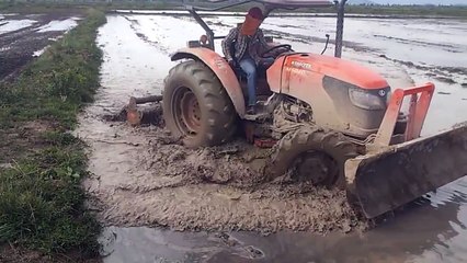 tractor kubota M6040Su, attachments, clear grass, prepare the ground, breaks ground