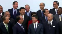 World leaders pose for photo at climate change summit in Paris