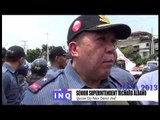Protesters egg anti-riot cops, burn Aquino effigy