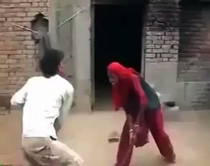 WIFE BEATING HER HUSBAND