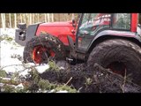 Valtra forestry tractor stuck in deep mud, extreme mud conditions