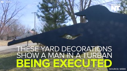 These Yard Decorations Show A Man In A Turban Getting Executed