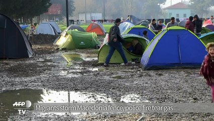 Migrants continue journey from Greece into Macedonia