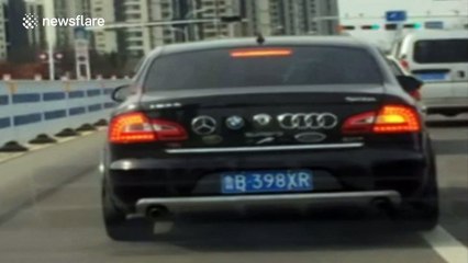 Man sticks luxury car logos on the back of his Skoda