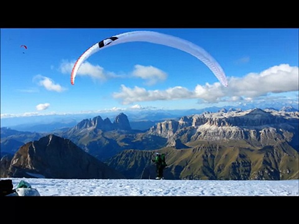 Dolomites Marmolada top landing Paragliding