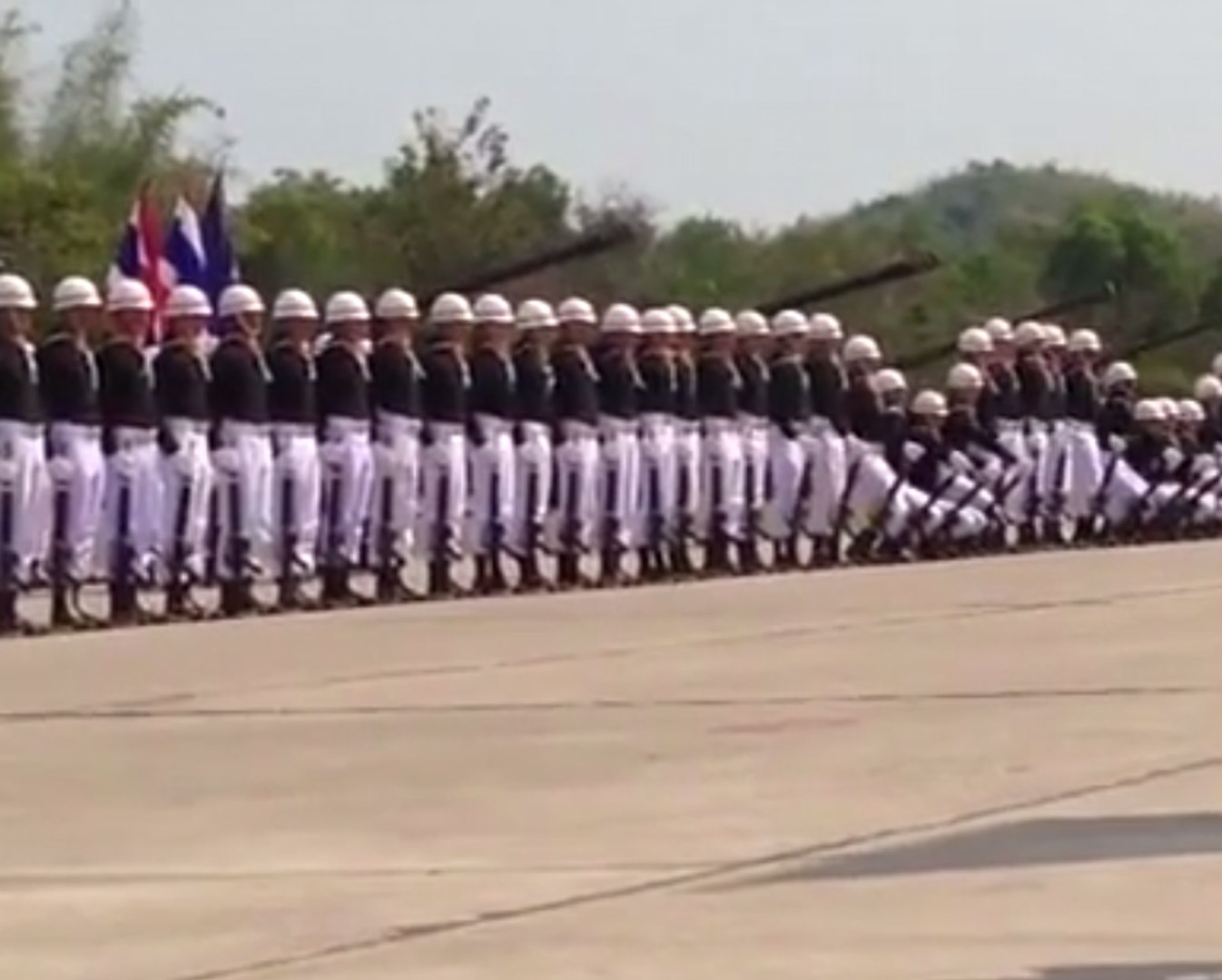 Soldiers stage a synchronised military parade