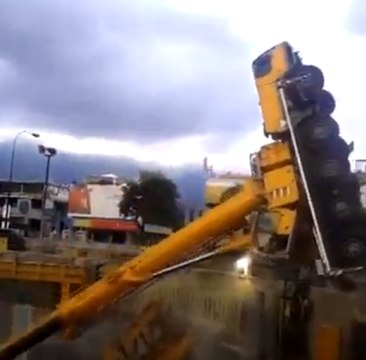 Two construction site cranes collapse