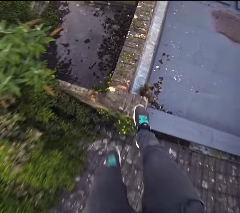 James Kingston walks on Cambridge rooftops