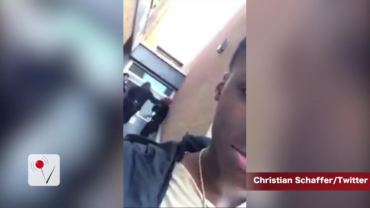 Baltimore Police Officer Slaps and Kicks Young Man at School