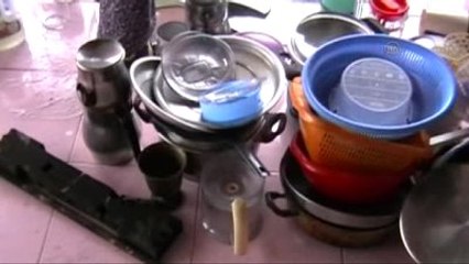 İtfaiyecinin Yaşlı Kadını Sırtında Taşıyarak Kurtarması