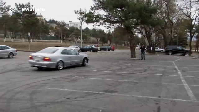 Two flashy drifting Mercedes drivers hit each other
